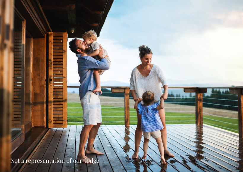 Family outside chalet