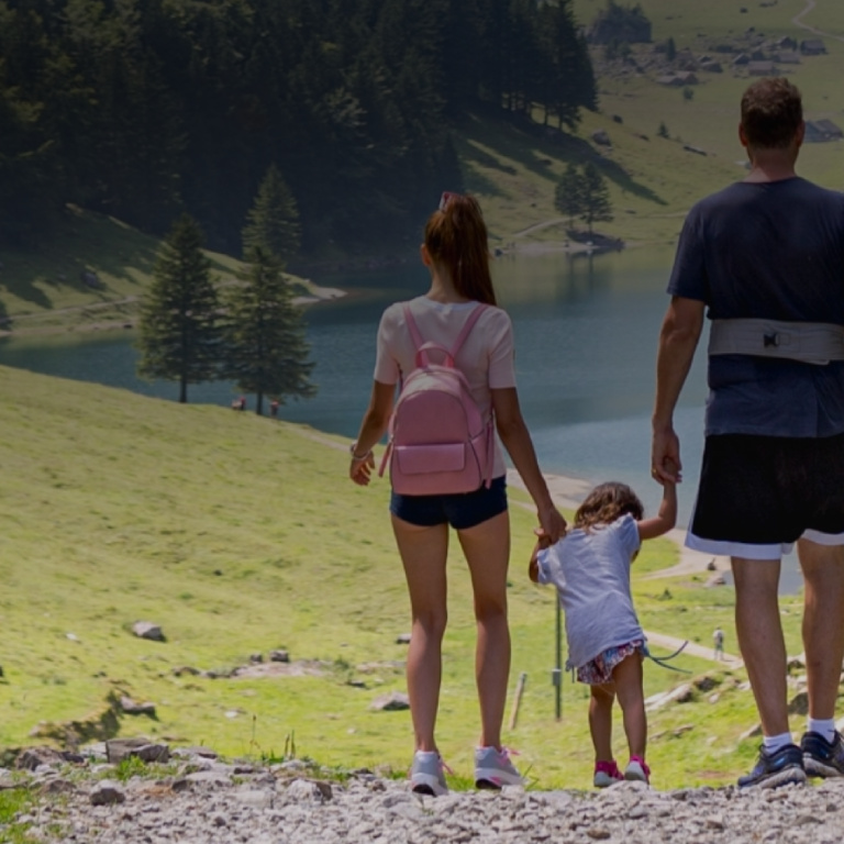 Family walking park in a sunny day