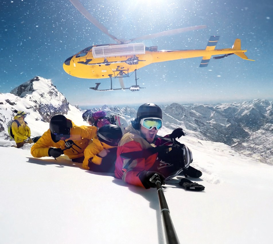 Group of people heli skiing