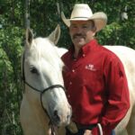 Man and horse in a sunny day 150x150