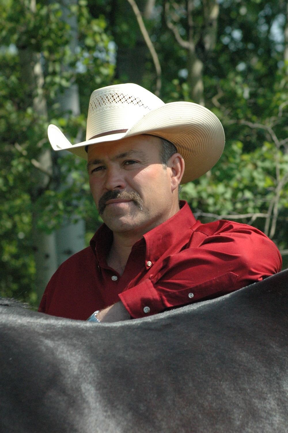 Man and horse riding