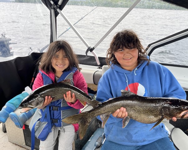 Boy and girl fishing