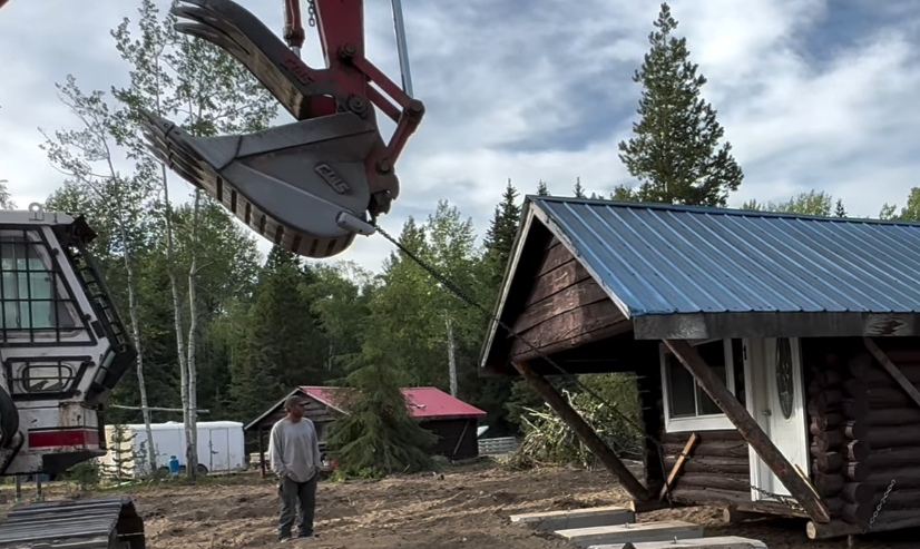 Man building cabin