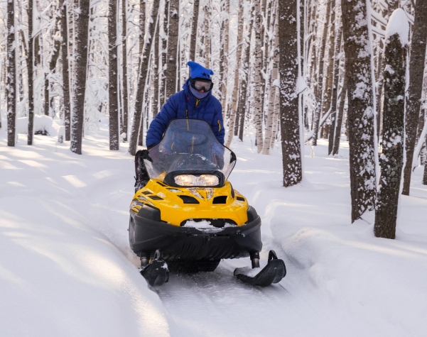 Man doing snowmobile