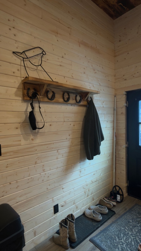 Wooden entrance area inside Sustutdene Eco Resort Lodge